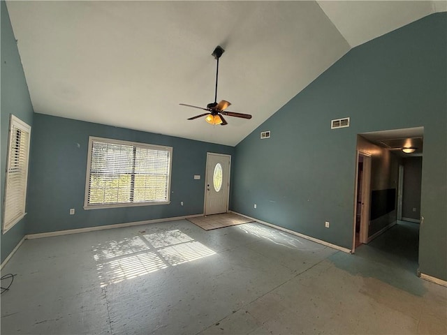 interior space featuring ceiling fan and high vaulted ceiling