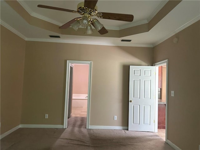 5901 Eastridge Pl, Mobile, AL 36608 - unfurnished bedroom featuring a raised ceiling, carpet floors, ornamental molding, baseboards, and ceiling fan
