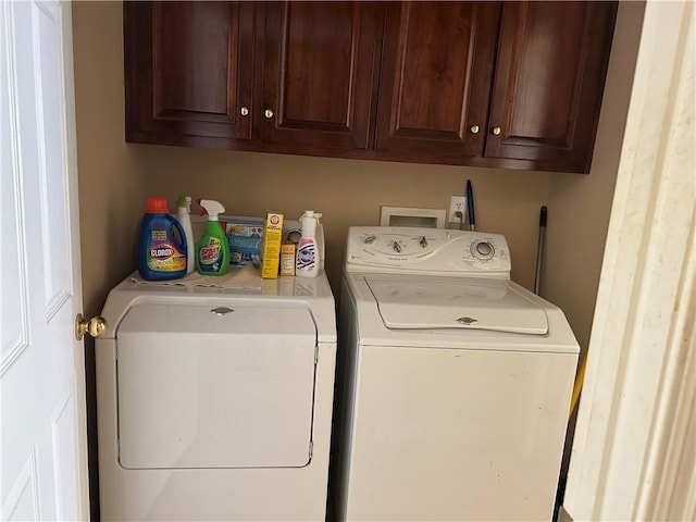 5901 Eastridge Pl, Mobile, AL 36608 - laundry room featuring washing machine and dryer and cabinet space