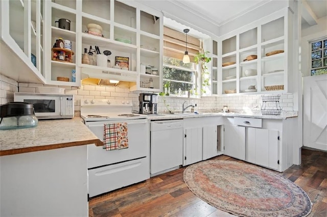 kitchen with dark hardwood / wood-style floors, white cabinets, white appliances, hanging light fixtures, and custom exhaust hood