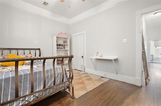 bedroom featuring ceiling fan and wood-type flooring