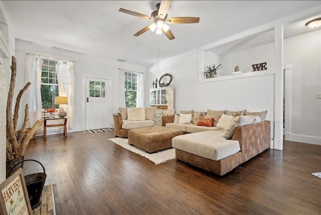 living room with ceiling fan and dark hardwood / wood-style floors