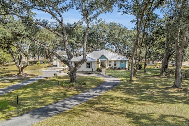 view of front of home with a front yard