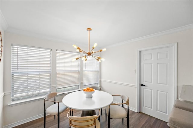 dining space with crown molding, a chandelier, and dark hardwood / wood-style flooring