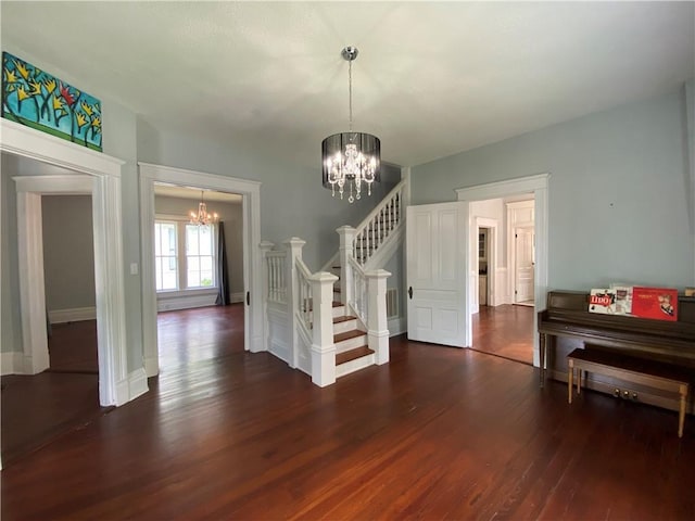 112 Kilmarnock St, Mobile, AL 36604 - entrance foyer with a chandelier, wood finished floors, stairs, and baseboards