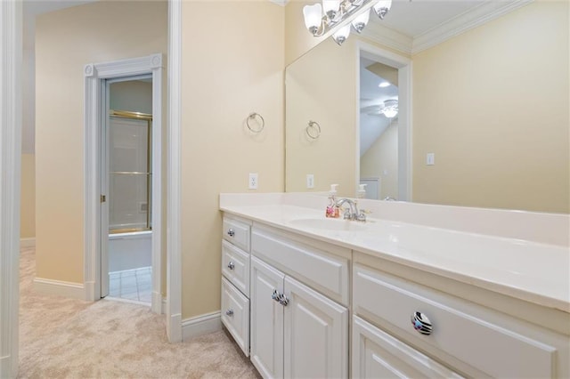 2605 Charleston Oaks Dr W, Mobile, AL 36695 - bathroom with vanity, crown molding, and ceiling fan