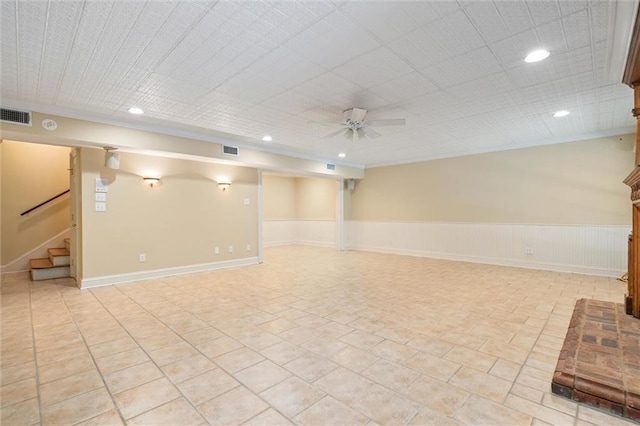 2605 Charleston Oaks Dr W, Mobile, AL 36695 - finished basement featuring ceiling fan, a wainscoted wall, stairs, and recessed lighting