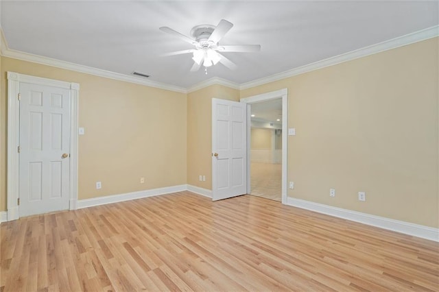 2605 Charleston Oaks Dr W, Mobile, AL 36695 - unfurnished room with light wood-type flooring, a ceiling fan, and ornamental molding