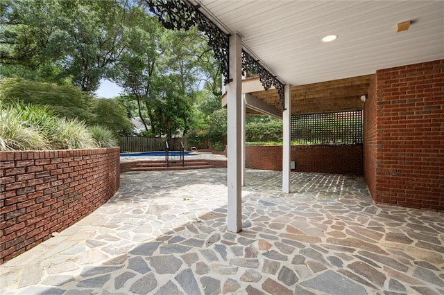 2605 Charleston Oaks Dr W, Mobile, AL 36695 - fenced backyard featuring a patio area