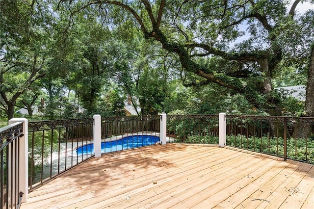 2605 Charleston Oaks Dr W, Mobile, AL 36695 - wooden terrace featuring view of wooded area