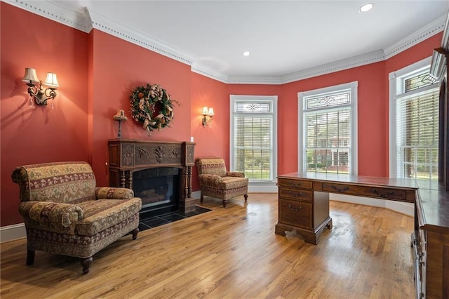 2605 Charleston Oaks Dr W, Mobile, AL 36695 - home office featuring wood finished floors, crown molding, recessed lighting, and a fireplace with flush hearth