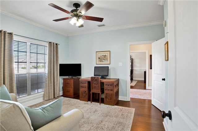 office space with crown molding, ceiling fan, and dark hardwood / wood-style flooring