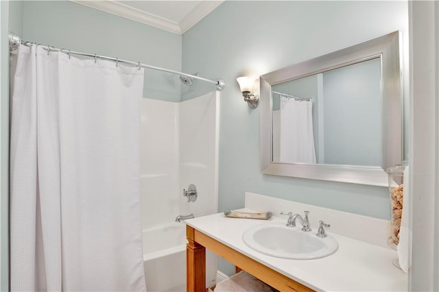 bathroom featuring sink, shower / tub combo, and ornamental molding