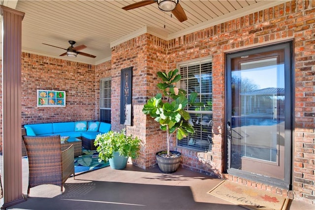 entrance to property with ceiling fan, a patio area, and outdoor lounge area