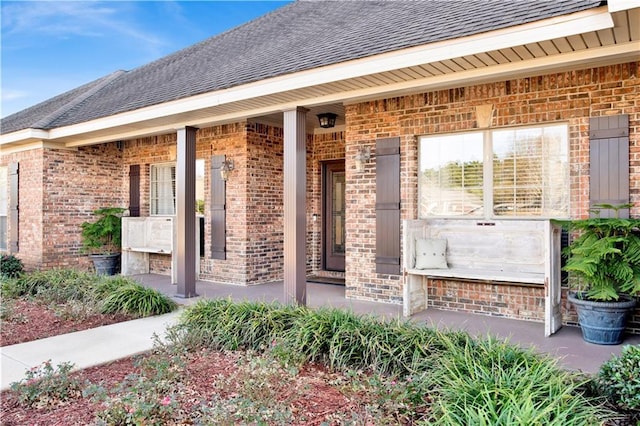 entrance to property with covered porch