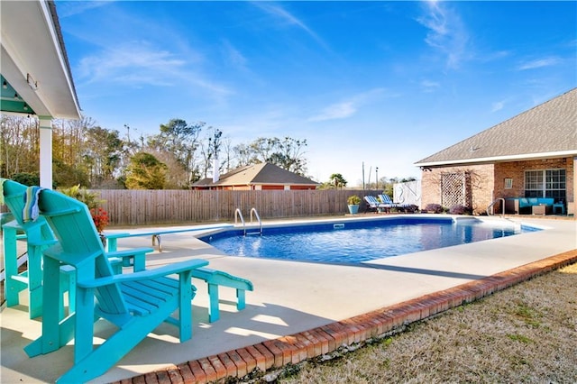 view of pool featuring a patio