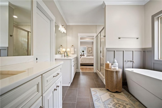 bathroom with tile patterned floors, vanity, separate shower and tub, and ornamental molding