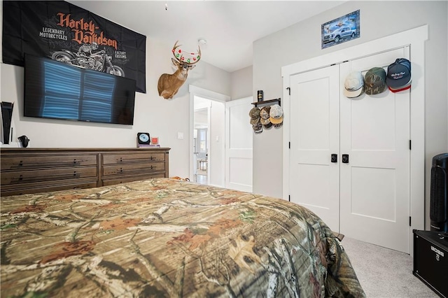 carpeted bedroom with a closet