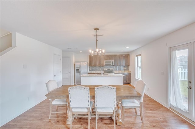 3473 Summer Woods Cir W, Mobile, AL 36695 - dining space featuring a chandelier, light wood-type flooring, baseboards, and recessed lighting