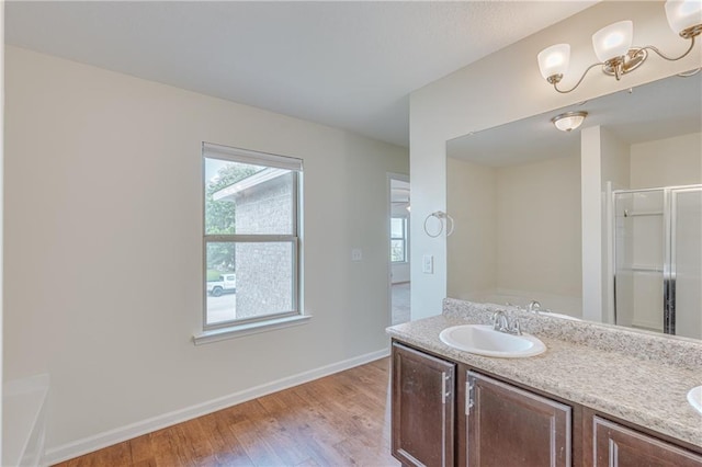 3473 Summer Woods Cir W, Mobile, AL 36695 - full bathroom featuring an enclosed shower, double vanity, wood finished floors, baseboards, and a bath
