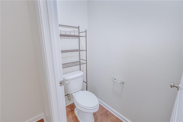 3473 Summer Woods Cir W, Mobile, AL 36695 - bathroom with wood finished floors, toilet, and baseboards