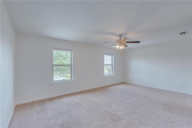 3473 Summer Woods Cir W, Mobile, AL 36695 - empty room with healthy amount of natural light, ceiling fan, and light carpet
