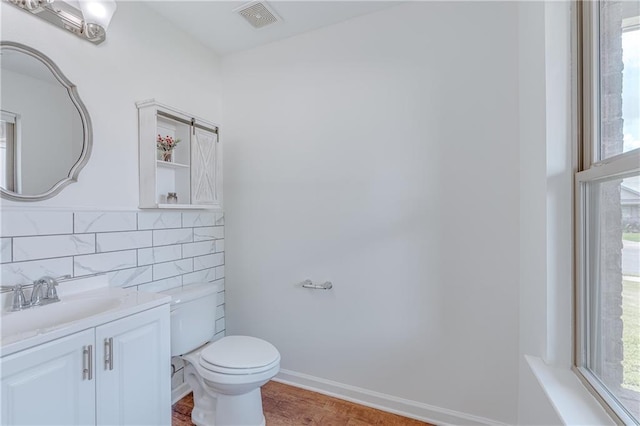 3473 Summer Woods Cir W, Mobile, AL 36695 - bathroom featuring vanity, toilet, and plenty of natural light