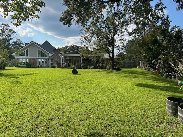 view of yard featuring fence