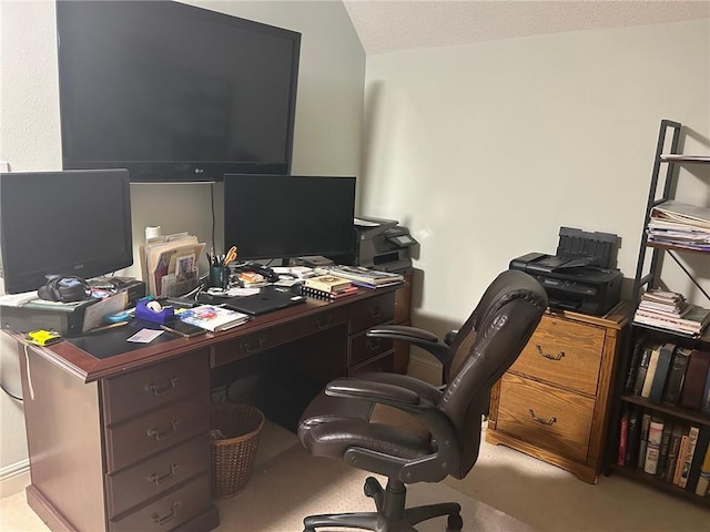 office with vaulted ceiling and a textured ceiling