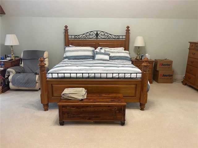 bedroom with light carpet