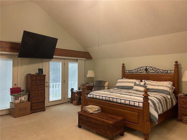 bedroom with multiple windows, access to outside, lofted ceiling, and light colored carpet