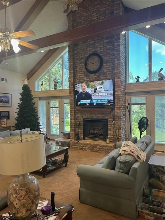 living area featuring french doors, high vaulted ceiling, beam ceiling, and visible vents