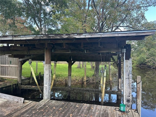 view of dock with a water view