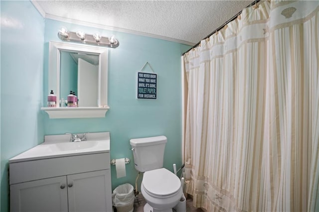 bathroom with toilet, vanity, crown molding, and a textured ceiling