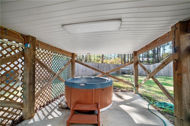 view of patio with a hot tub