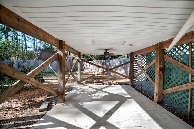 view of patio featuring ceiling fan