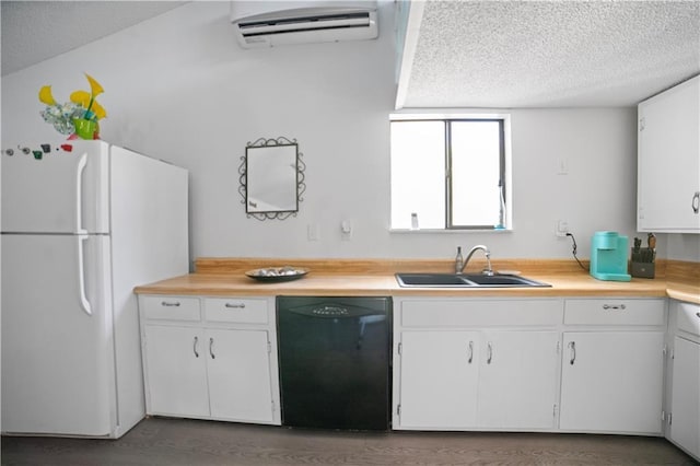 kitchen featuring white cabinets, dishwasher, white fridge, sink, and a wall mounted AC