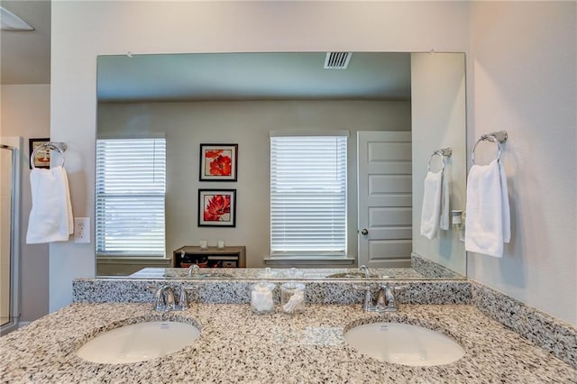 bathroom with double sink vanity