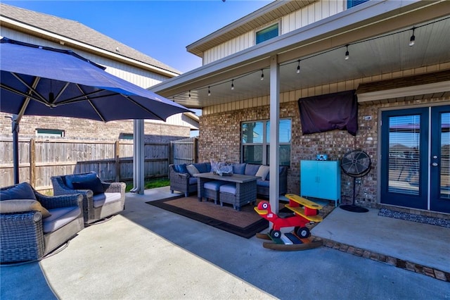 view of patio with french doors and an outdoor hangout area