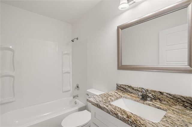bathroom featuring toilet, shower / bath combination, and vanity