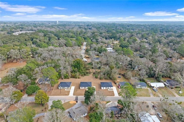 drone / aerial view with a view of trees