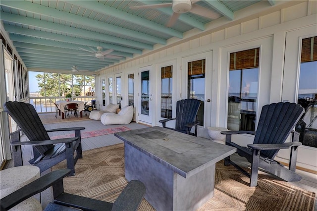 view of patio with french doors and ceiling fan