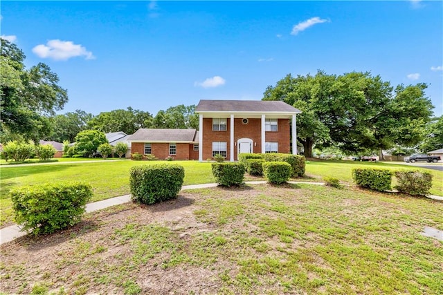 view of front of home featuring a front yard