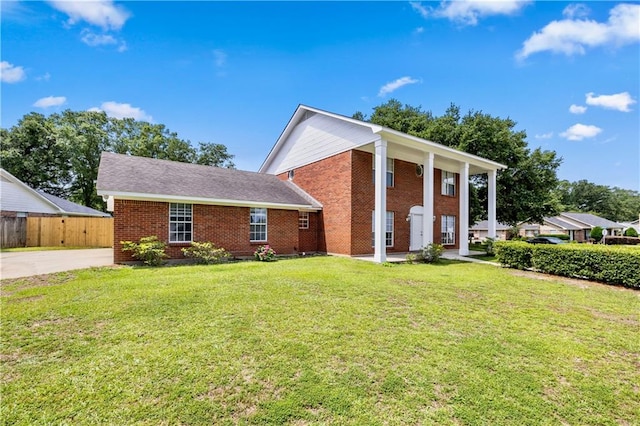 view of front of house with a front lawn