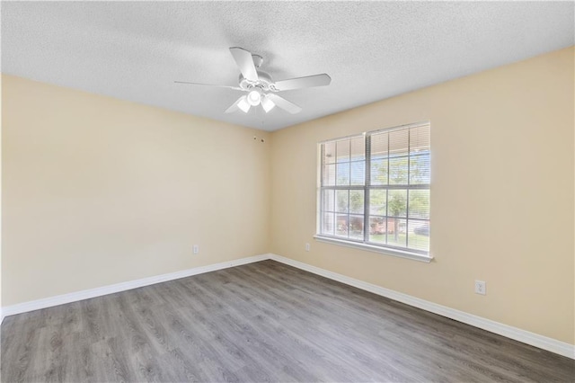 unfurnished room with hardwood / wood-style floors, a textured ceiling, and ceiling fan
