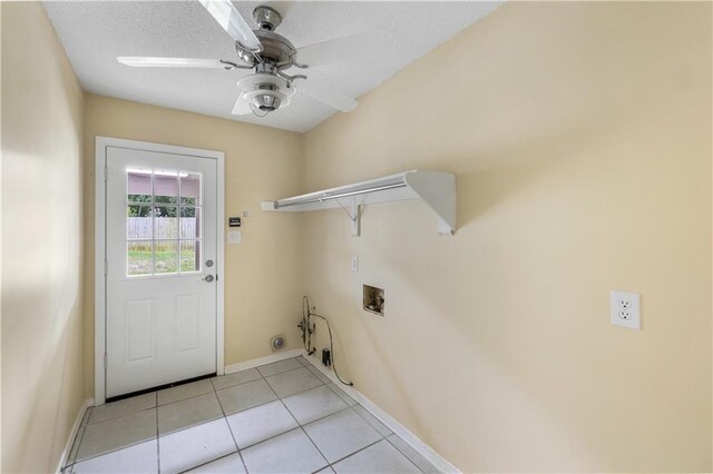 washroom with hookup for a washing machine, gas dryer hookup, ceiling fan, and light tile patterned floors