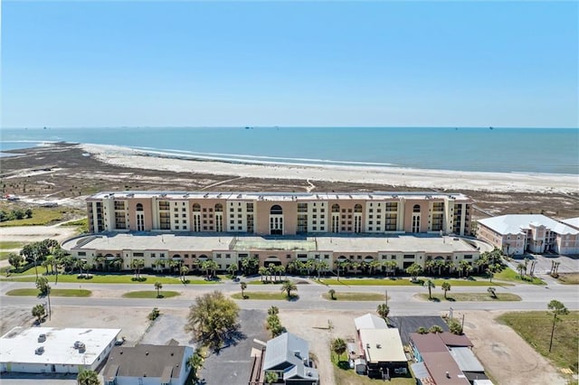 bird's eye view with a view of the beach and a water view