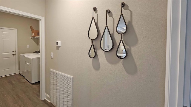 9851 Nadine Ln, Mobile, AL 36695 - laundry room featuring washer / clothes dryer and dark wood-style floors