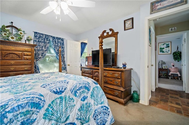 bedroom with carpet flooring and ceiling fan