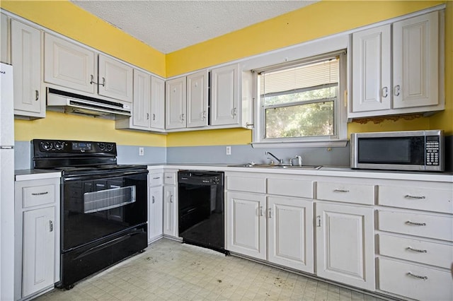 kitchen featuring white cabinetry, black appliances, sink, and a textured ceiling